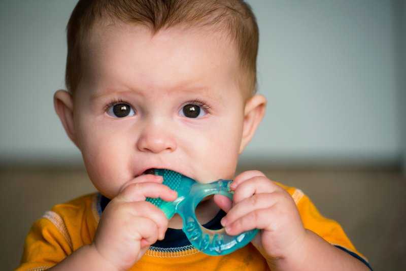 Child using a teething ring